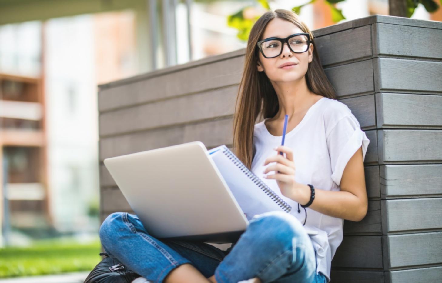 Students collaborating on financial presentation project