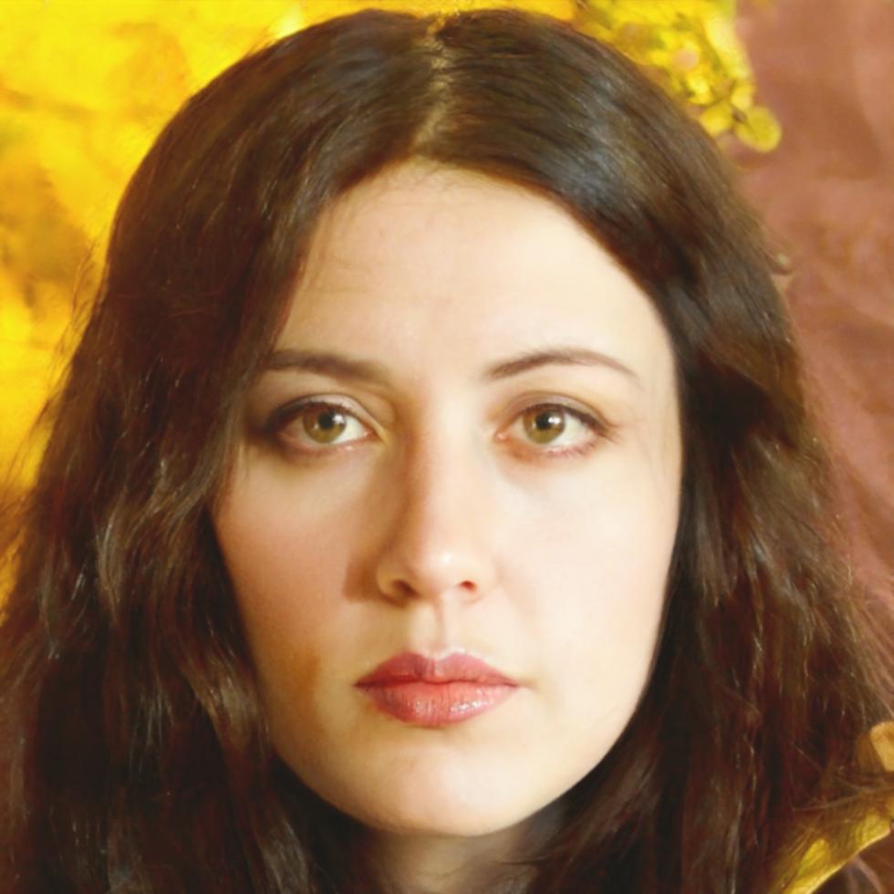 Professional headshot of Rebecca Martinez, financial analyst